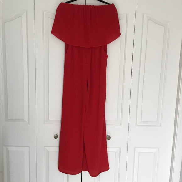 Tyche Pants - Tyche red off-shoulder jumpsuit, size S.